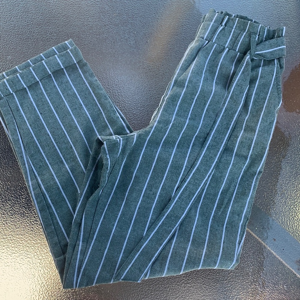 Green and white striped dress pants